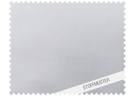 Hochwertiges Stoffmuster der Bettwäsche Vento in elegantem Damast, zart wassergrüner Farbton mit weißem Kettfaden in Satinbindung. Melierte Webung zeigt feine Farbübergänge. Stoffmuster zu Bettwäsche Vento, Damast. Hersteller: Stoffkontor