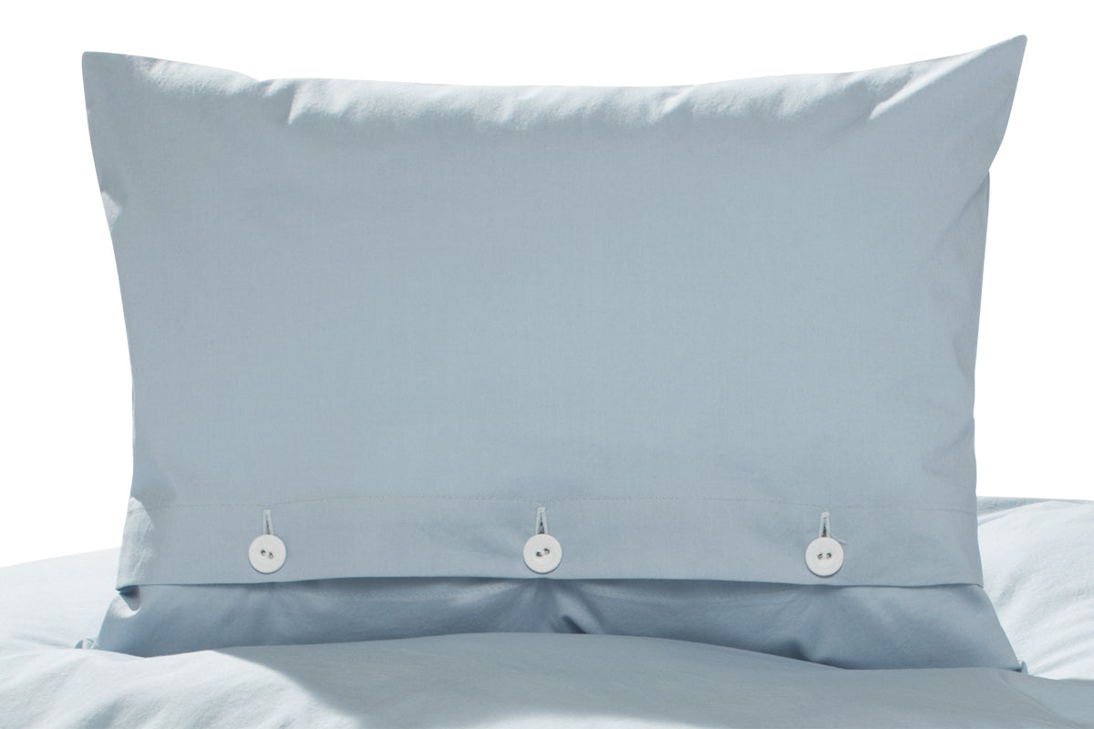 Blaue Bettwäsche aus gewaschener Baumwolle